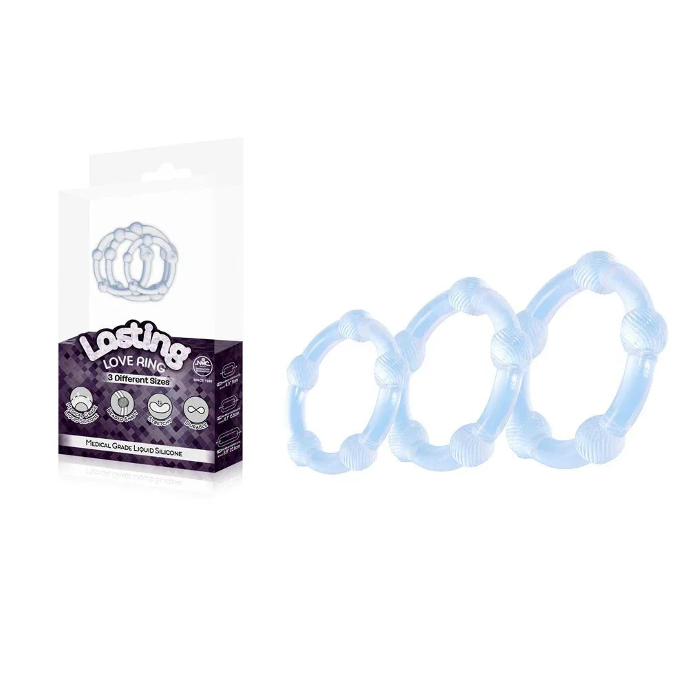 Lasting Love beaded cock rings set of 3 in Clear, pale trio beside the box