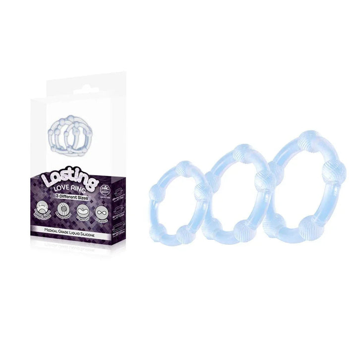 Lasting Love beaded cock rings set of 3 in Clear, pale trio beside the box