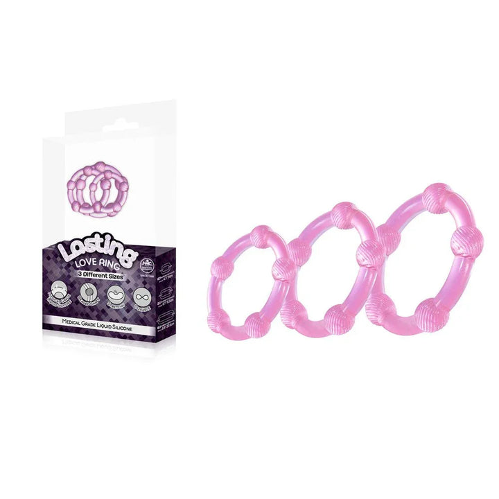 Lasting Love beaded cock rings set of 3 in Pink, three sizes beside the box