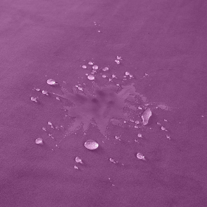 Water beading on the purple microvelvet surface of the Fascinator throw