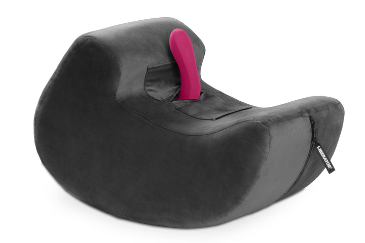 Black Liberator Pulse with a pink toy held upright in its pocket