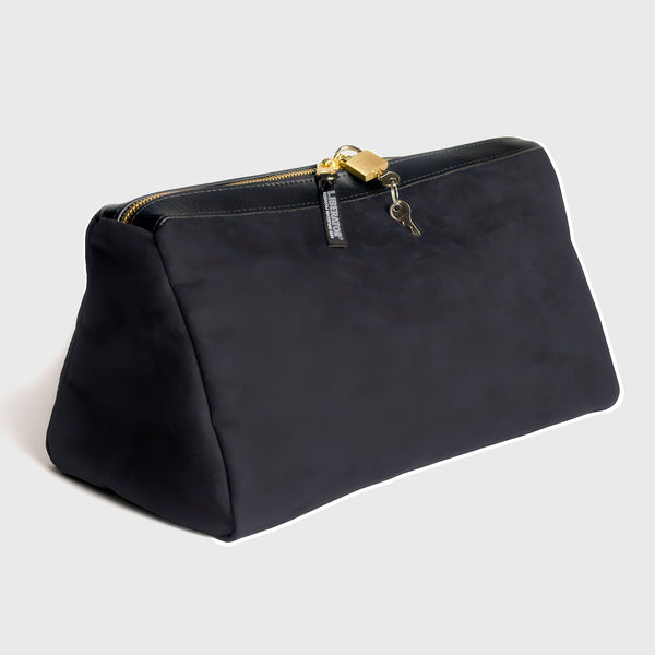Liberator Tallulah locking toy case in black microsuede with gold-tone zip and padlock