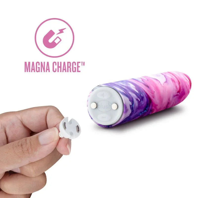 Magna Charge magnetic charger held beside the Entangle bullet's contact base