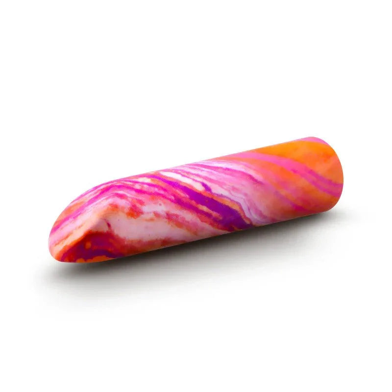 Coral Fiery bullet lying on the diagonal, rounded tip to the left