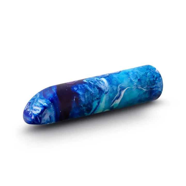 Blue Mesmerize bullet lying on the diagonal, rounded tip to the right