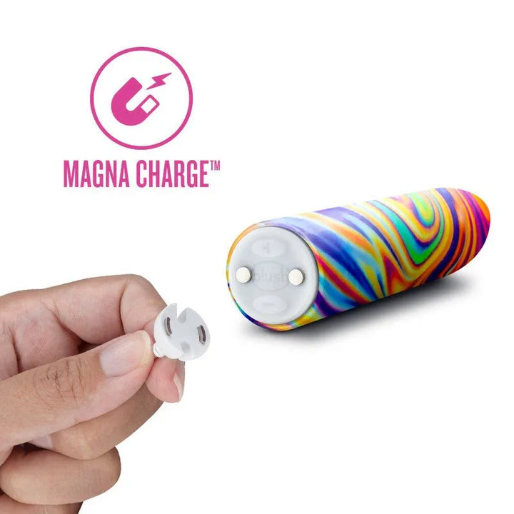 Magna Charge magnetic charger held beside the rainbow Psyche bullet's contact base