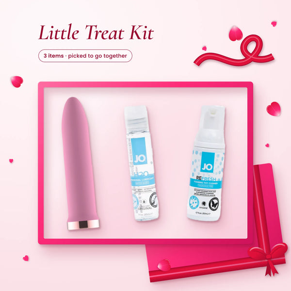 Little Treat Kit: a pink rechargeable bullet vibrator, JO H2O lube and JO foaming toy cleaner on a pink backdrop