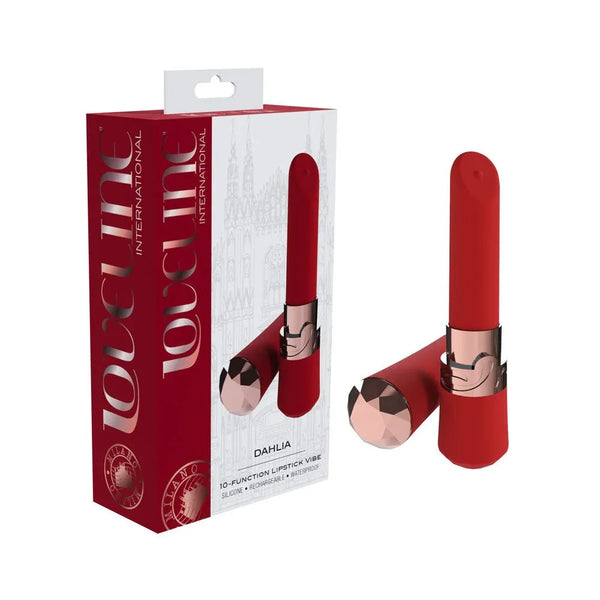 Loveline Dahlia Lipstick Vibrator in Red, red retail box beside the lipstick vibe with its cap removed