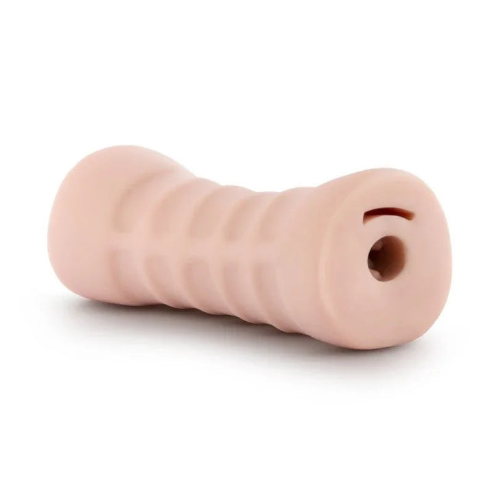 Rain stroker lying down, open end with the exit hole turned toward the camera