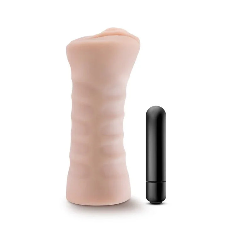 M for Men Rain stroker standing upright in flesh tone with the black bullet alongside