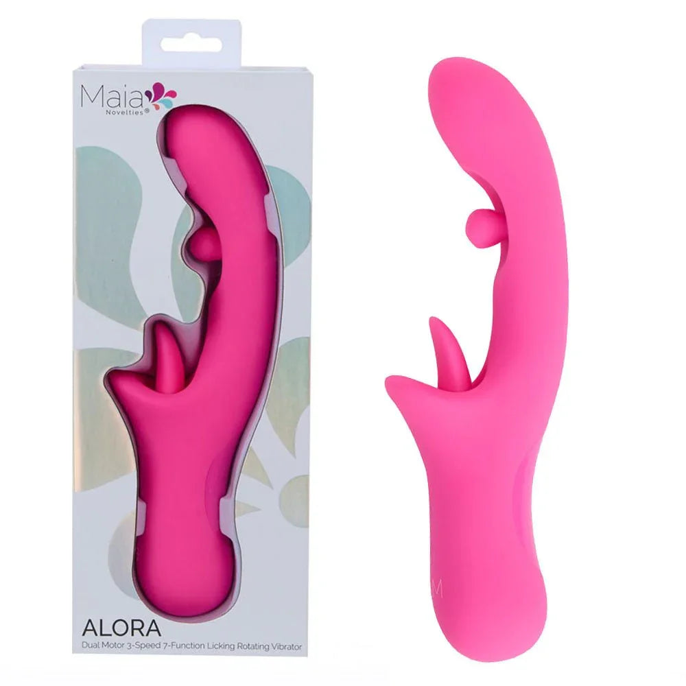 Maia Alora licking rotating vibrator in Pink, beside its Maia retail box