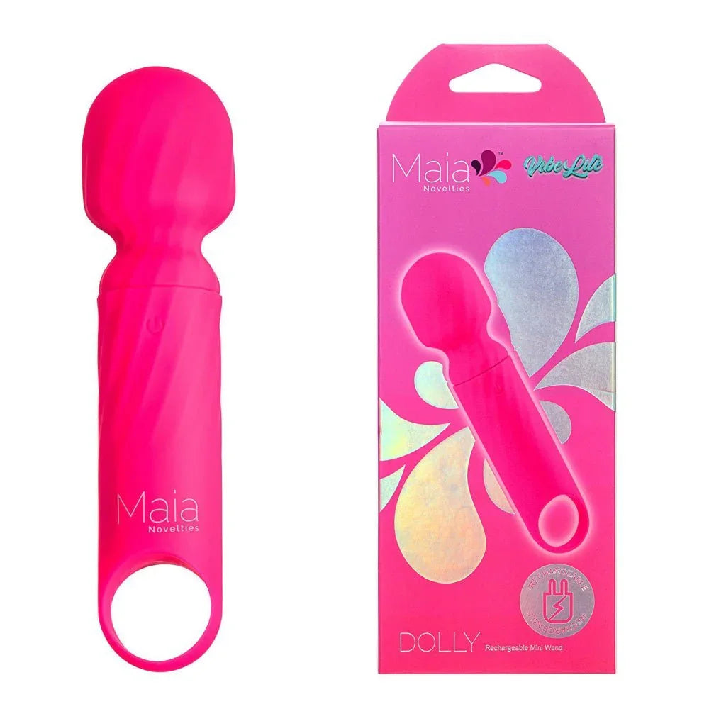 Maia Dolly mini wand in Pink with a looped handle, beside its pink Maia box