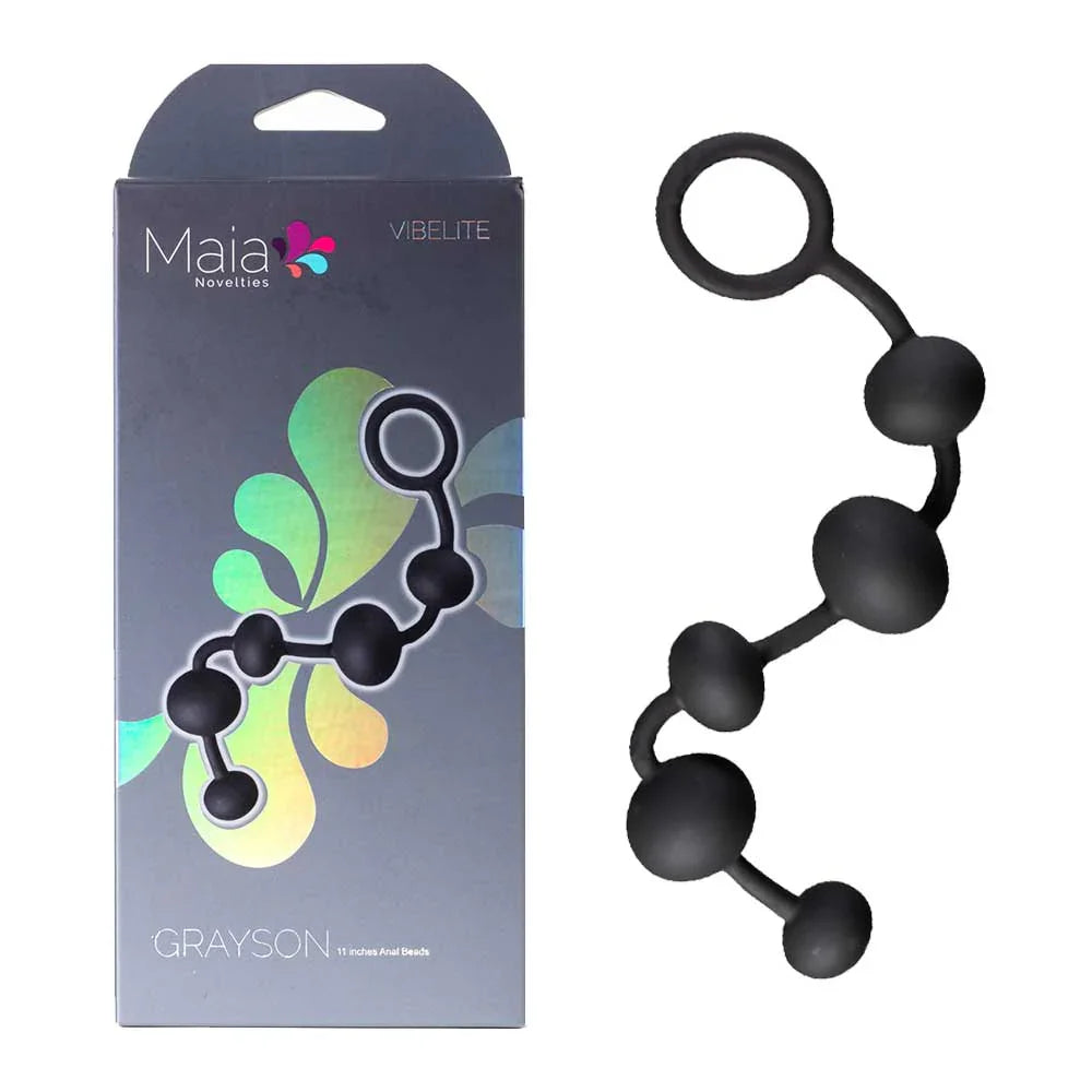 Maia Grayson anal beads in Black, 16.5 cm beaded strand beside its Maia box