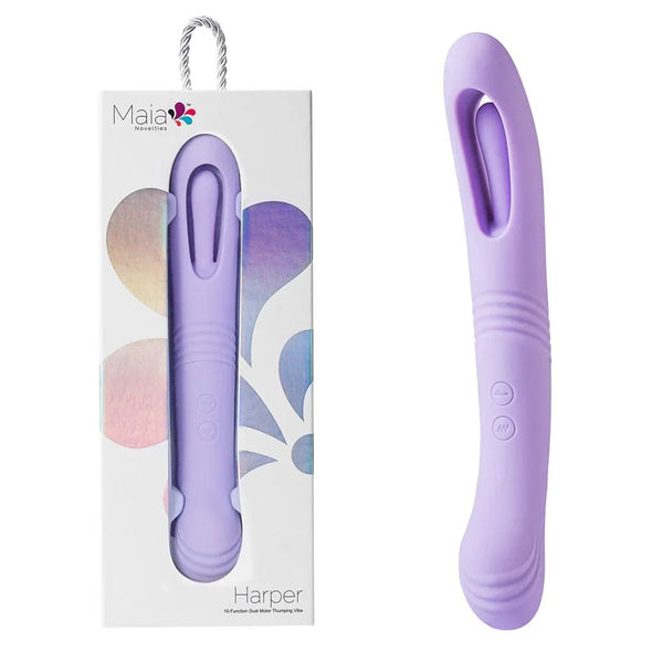 Maia Harper tongue thumping vibrator in Lavender, beside its Maia box