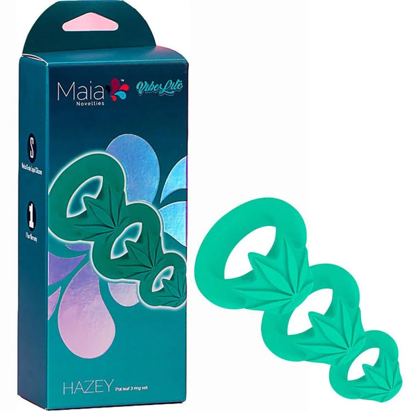 Maia Hazey cock rings in Green, three cannabis leaf rings beside the teal Maia box