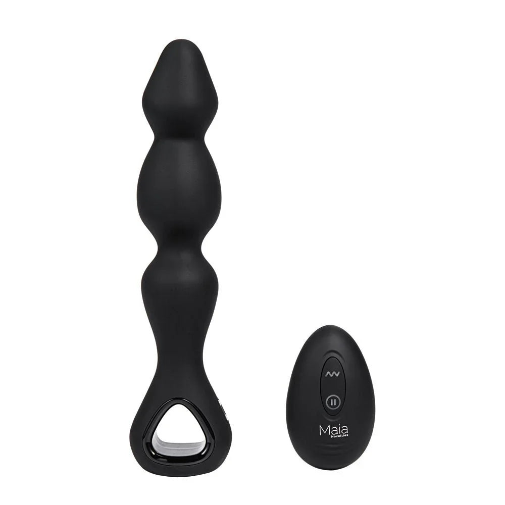 Maia Hudson beaded anal vibrator in Black beside its oval remote, no packaging