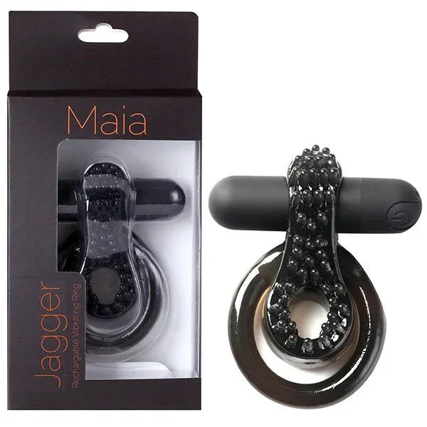 Maia Jagger vibrating cock and balls ring in Black with a studded pad, beside its box