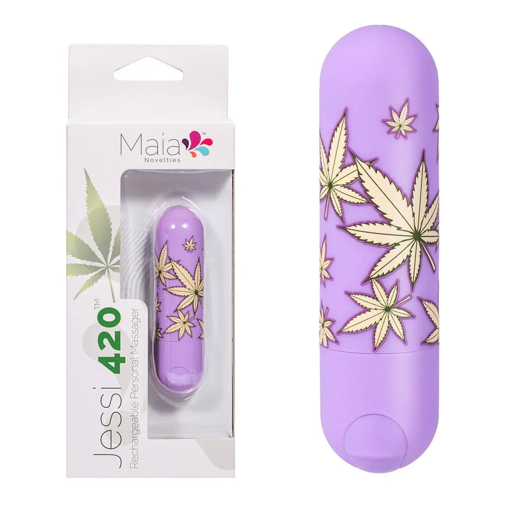 Maia Jessi 420 bullet in Violet with a gold leaf print, beside its Maia pack