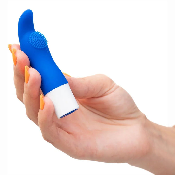 Maia Kapri mini vibe in Blue held in a hand, showing the white base and its scale