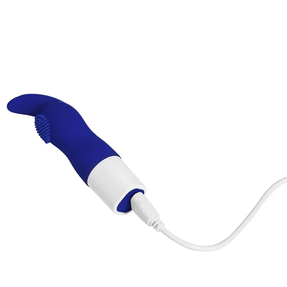 Maia Kapri mini vibe in Blue lying down with the USB charging cable plugged in