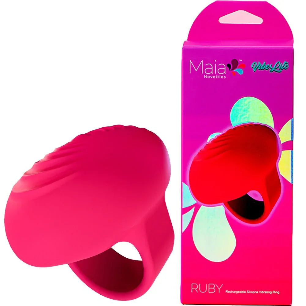 Maia Ruby finger stimulator in Pink, ridged pad and finger loop, beside its pink box