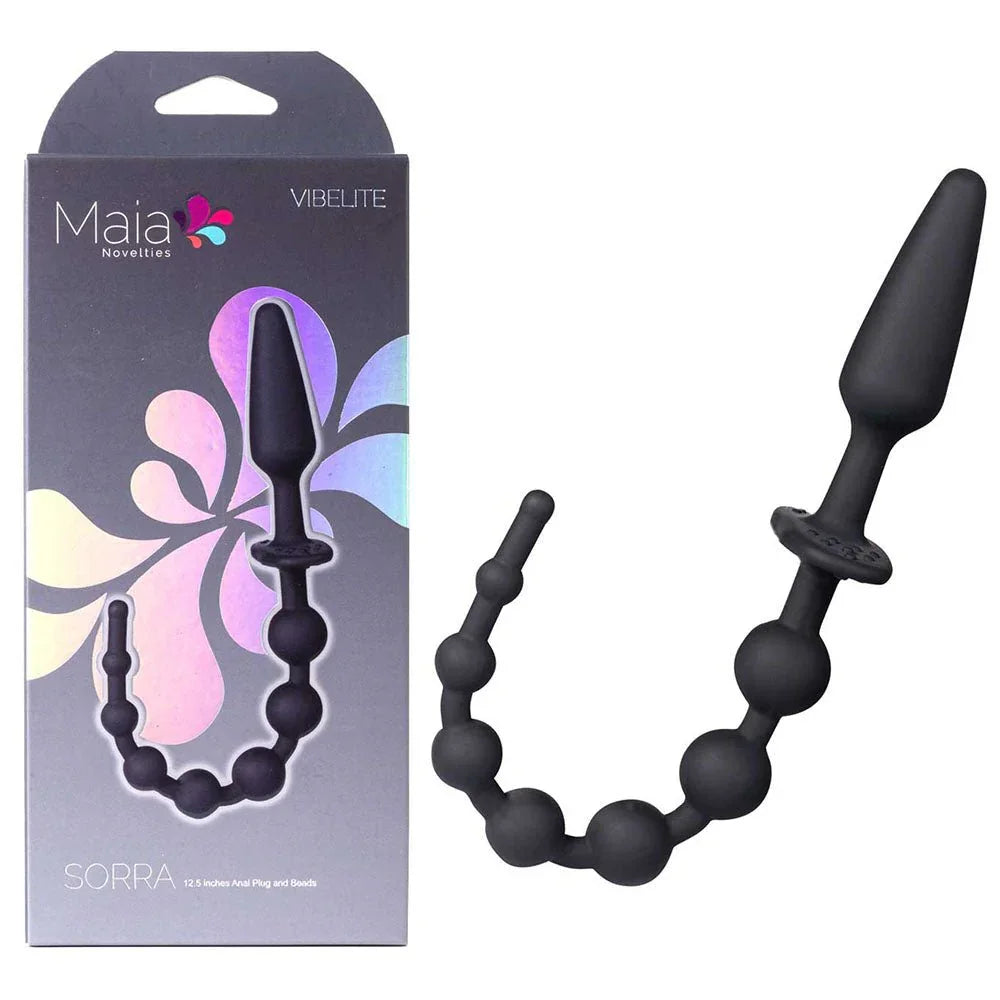 Maia Sorra dual-ended anal plug and bead chain in Black, beside its Maia box