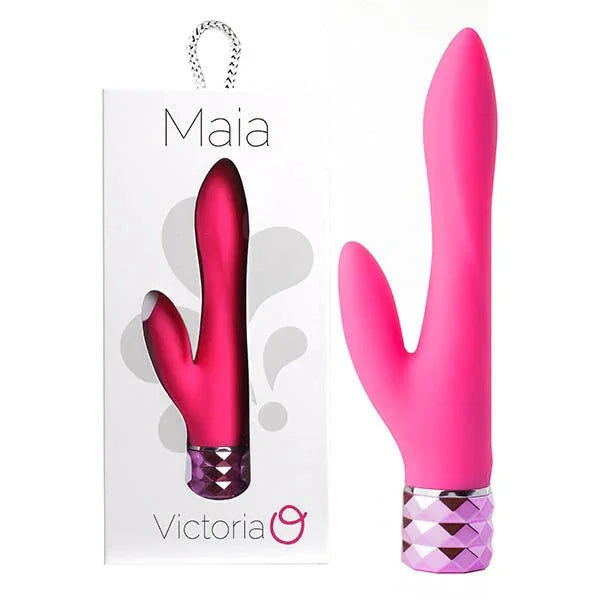 Maia Victoria rabbit vibrator in Pink with a faceted base, beside its Maia box