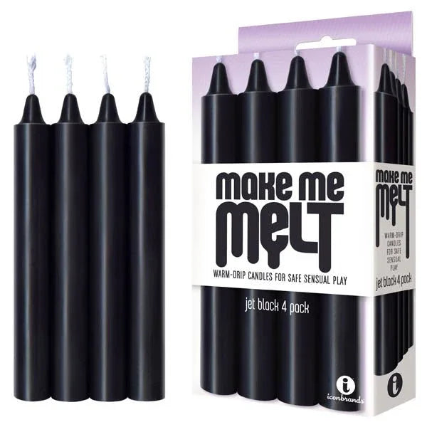 Make Me Melt jet black drip candles, four tapers standing beside the four-pack box
