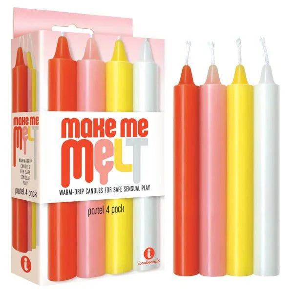 Make Me Melt pastel drip candles in coral, pink, yellow and cream beside their box