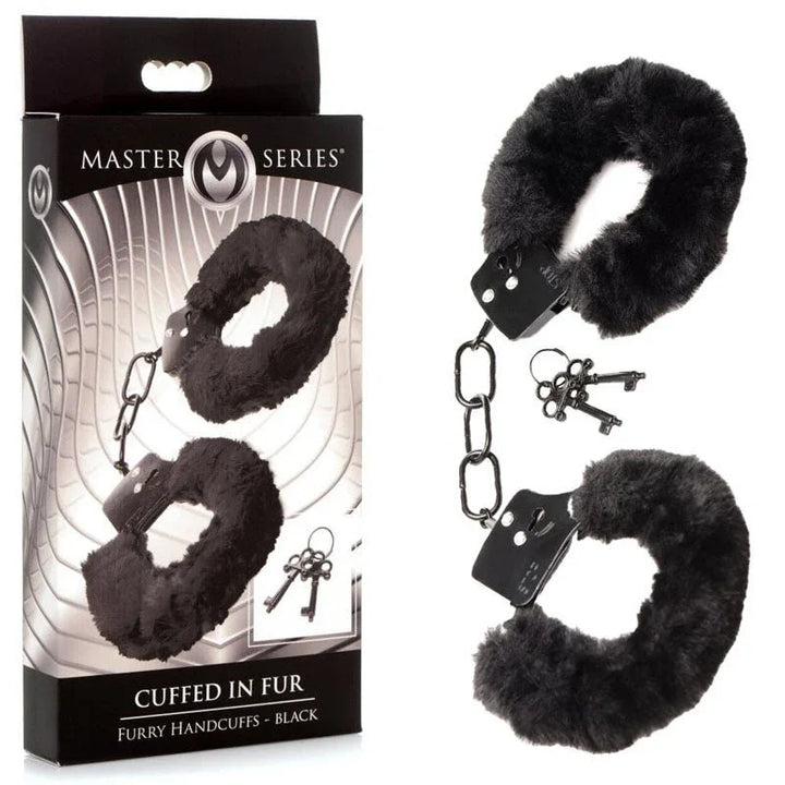 Master Series Cuffed in Fur handcuffs in Black beside the Master Series retail box
