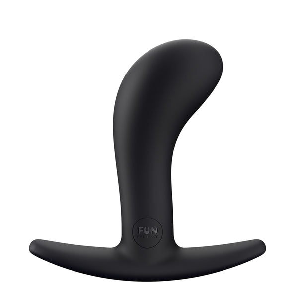 Fun Factory Bootie M in Black, upright on its curved anchor base