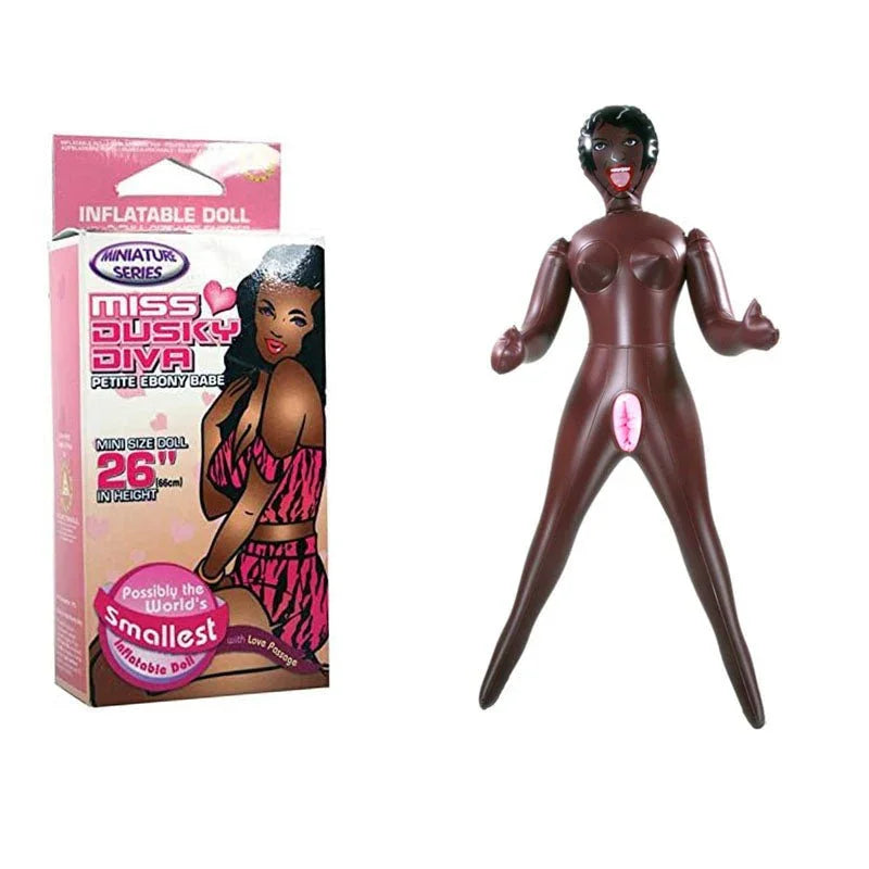 Miss Dusky Diva mini inflatable ebony doll beside its pink 26 inch box
