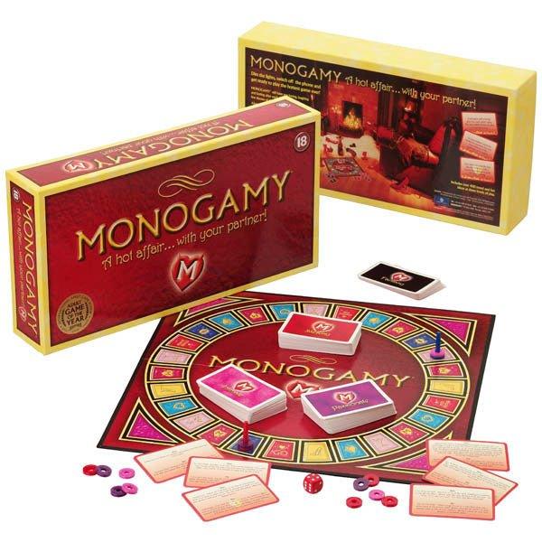 Monogamy board game, red board, cards and tokens in front of the box