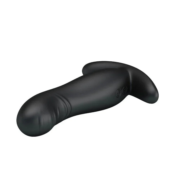 Mr Play prostate massager lying down, ribbed underside toward camera