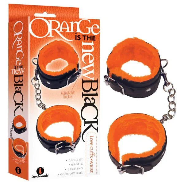Orange Is The New Black Love Cuffs box, picturing black wrist cuffs lined in orange fur