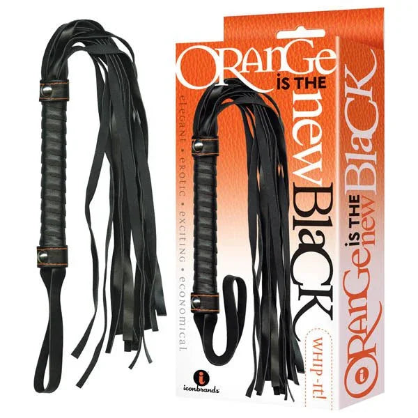 Orange Is The New Black Whip-it! flogger, black falls and a wrapped handle, beside its box