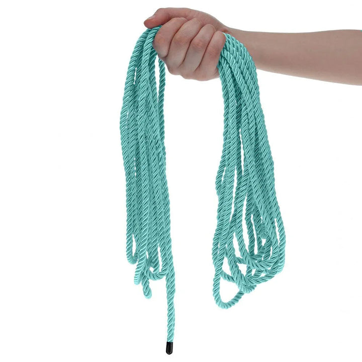 OUCH! Nylon Bondage Rope 10m in Blue, held up with the aqua loops hanging free against white