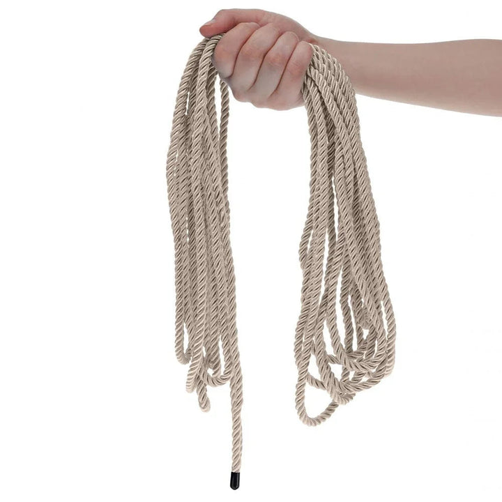 OUCH! Nylon Bondage Rope 10m in Gold, held up with the champagne loops hanging free