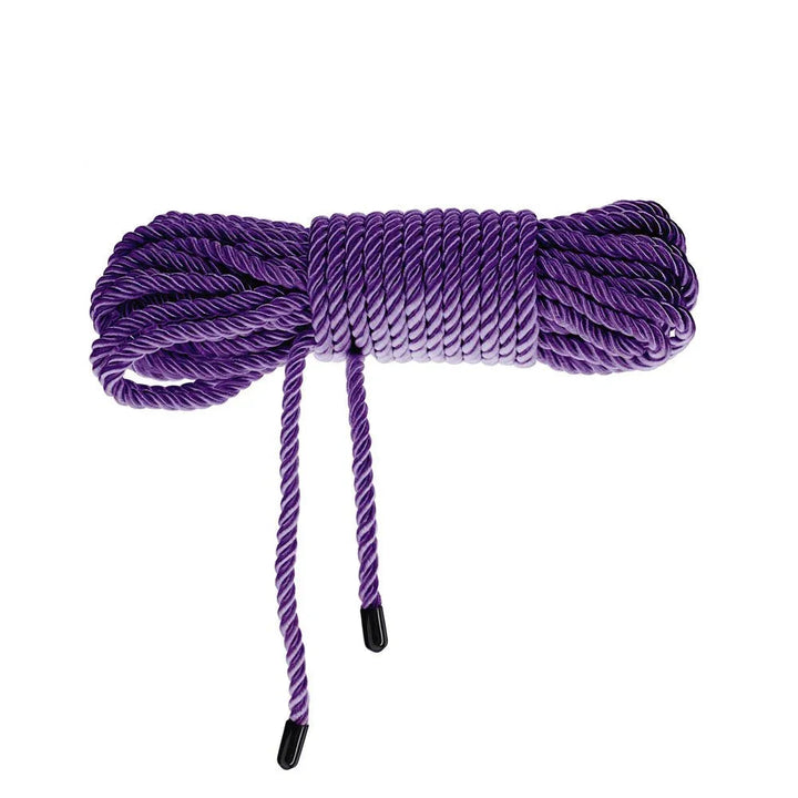 OUCH! Nylon Bondage Rope 10m in Purple, coiled bundle on white showing the black whipped ends