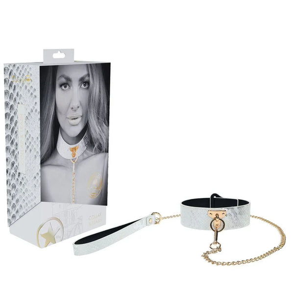 OUCH! Florence Bondage Collar with Leash in White, retail box beside the collar and gold chain leash