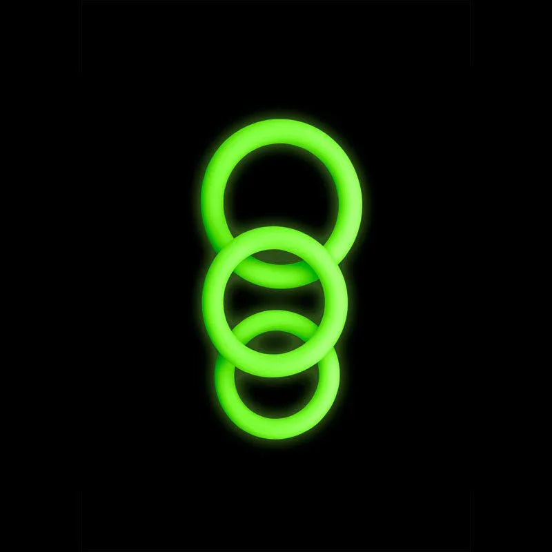 OUCH! Glow in the Dark Cock Ring Set of 3 in Green, the three rings glowing against a black background