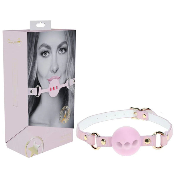 OUCH! Paris Breathable Ball Gag in Pink, retail box beside the pink strap and vented pink ball