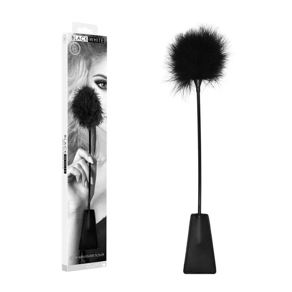 OUCH! Black & White Crop with Feather Tickler in Black, retail box beside the crop with its feather tip