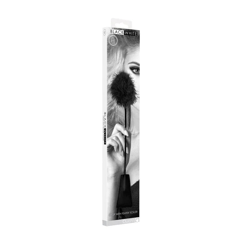 OUCH! Black & White Crop with Feather Tickler in Black, the Black & White retail box shown at an angle
