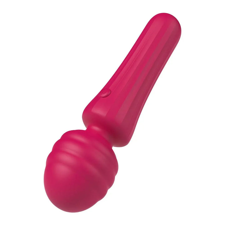 Party Up Duuna Massage Wand in Pink lying diagonally, head at the lower left
