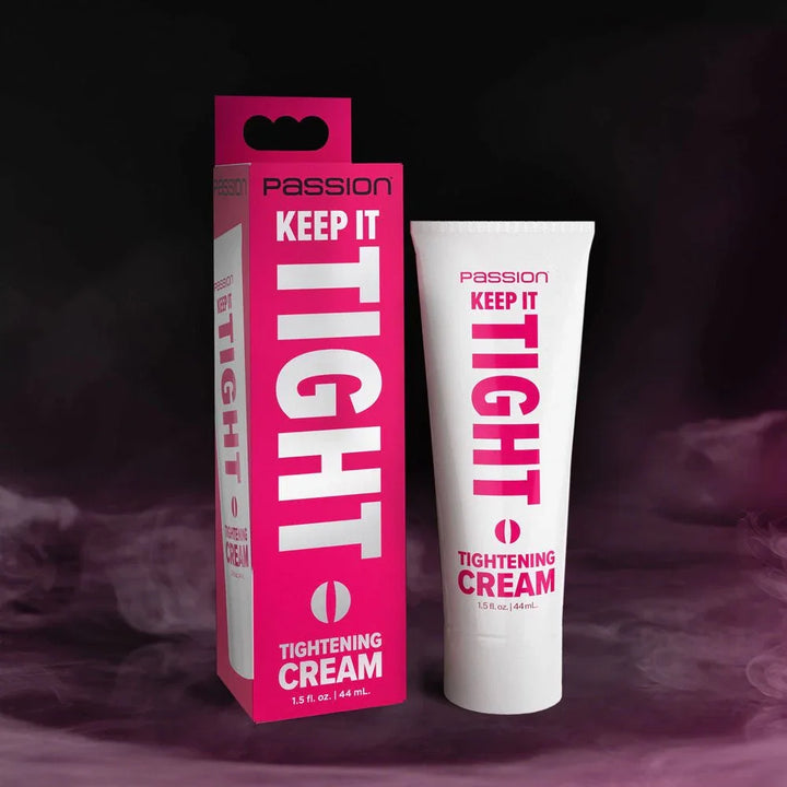 Passion Keep It Tight tightening cream, white tube beside its pink carton on a dark backdrop