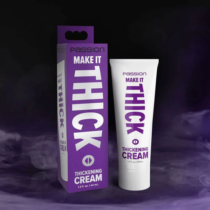 Passion Make It Thick thickening cream, white tube beside its purple carton on a dark backdrop