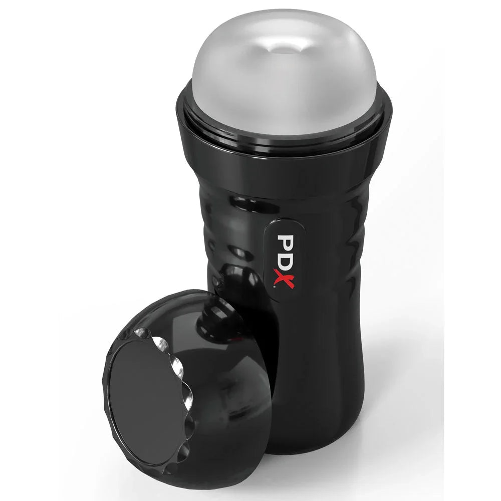 Super Slide & Glide stroker tilted with its black end cap lying beside it