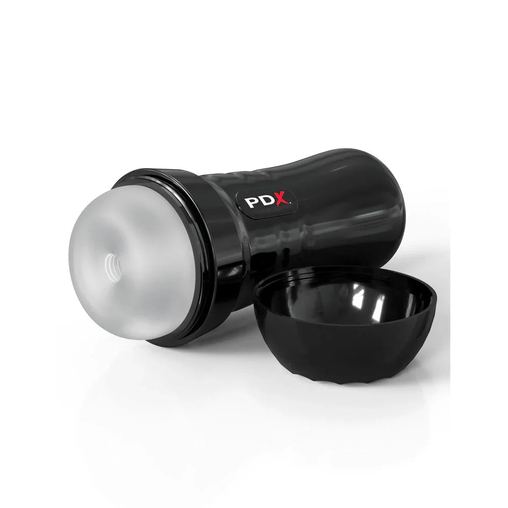 Super Slide & Glide stroker on its side next to the removed black cap
