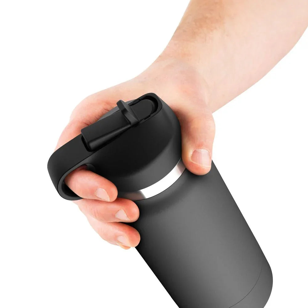 Hand gripping the closed Fuck Flask by its lid loop